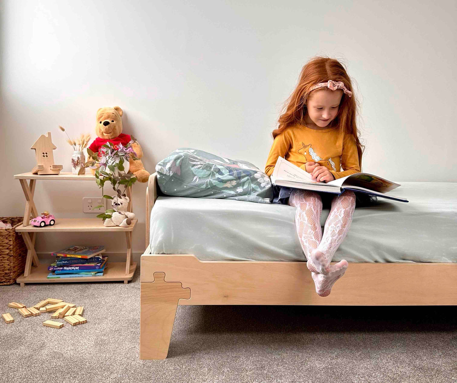 Versatile wooden flippable bed frame for kids and toddlers. Adjustable height allows it to grow with your child, based on Montessori method. Perfect solution for independent sleep.