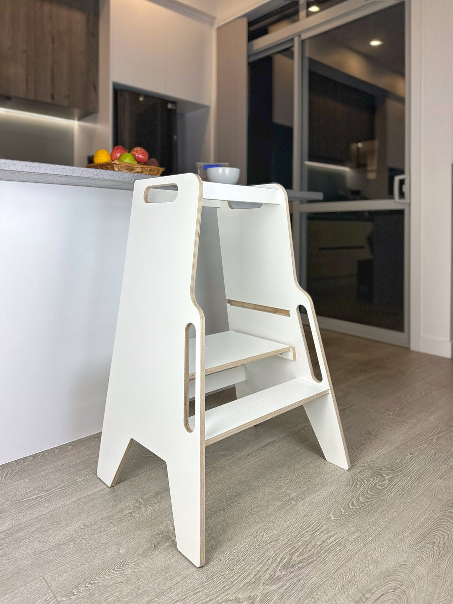 The perfect height every time! Montessori Kitchen Helper adapts with them.