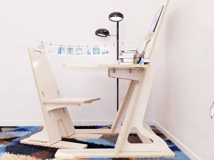 NZ-made table-chair set: height-adjustable, converts into an easel. Perfect for your curious 3+ year old.