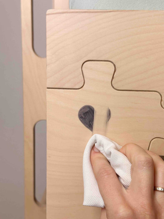 Finished birch plywood surface with smooth sealed edges, easy-clean child-safe material used in kids furniture