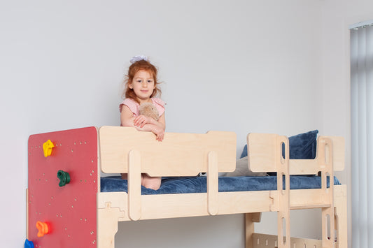 Handcrafted KitSmart kids' bed: authentic NZ-made design, quality wood finish, styled in a cozy room setting. Auckland's finest for young ones.