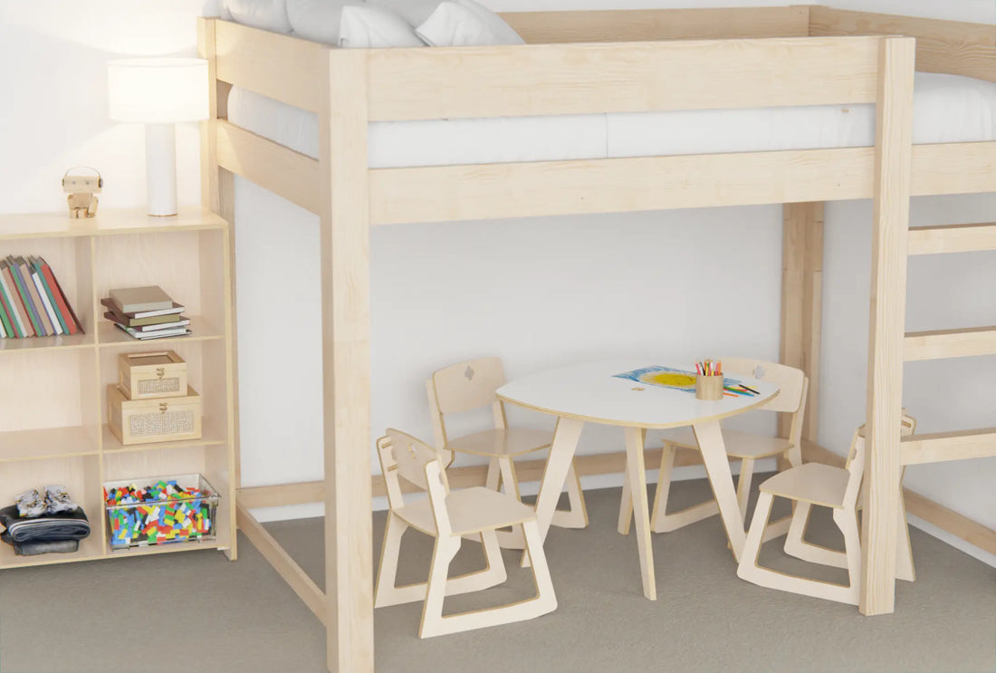 Children’s loft bed with a study desk and chairs underneath, showing a space-saving design that supports play and learning