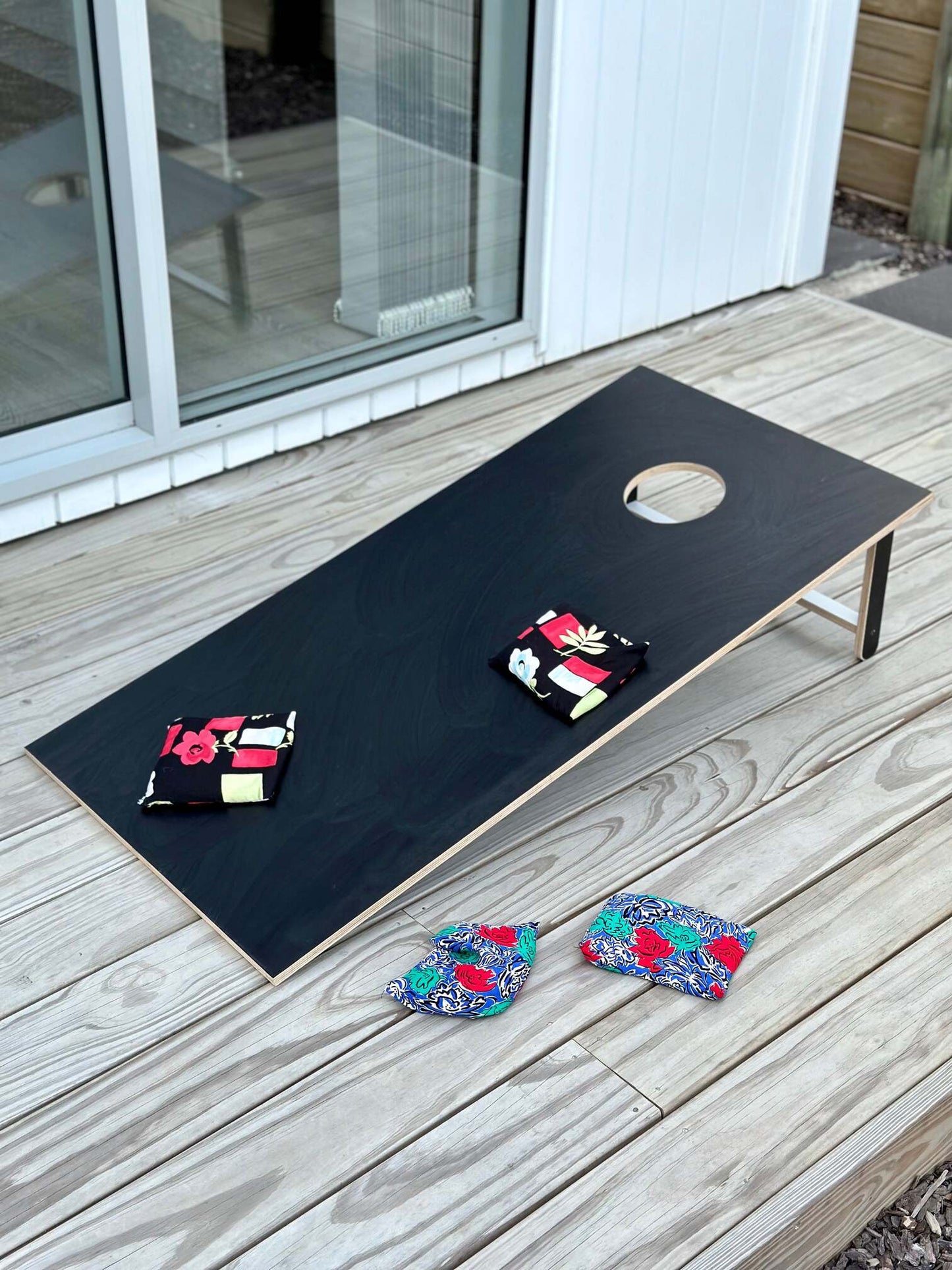 Get ready for outdoor fun with our Cornhole game board. A crowd-pleaser at any backyard gathering.