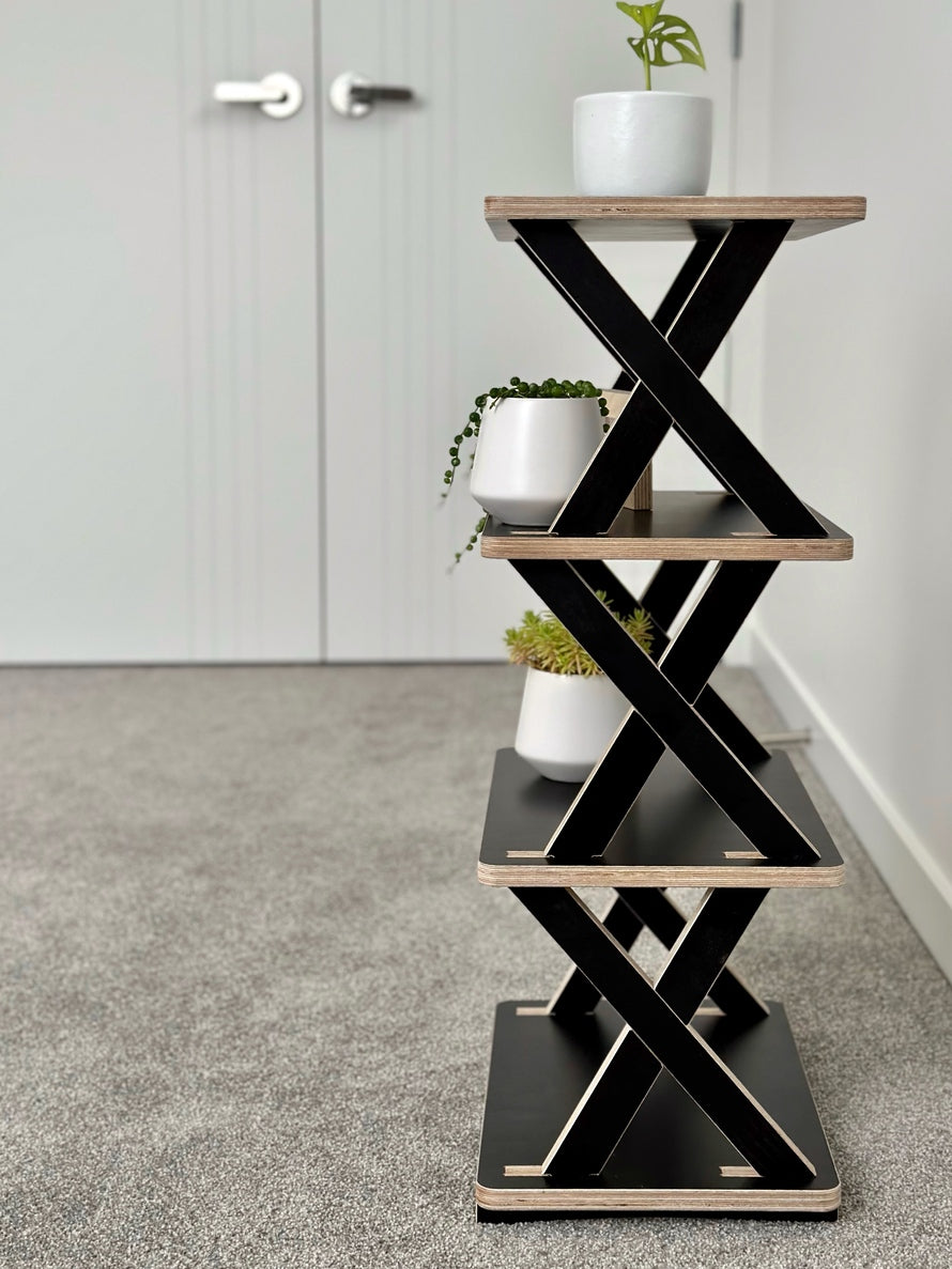 NZ's sleek black plywood free standing shelf - modern design meets natural beauty.