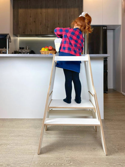 Step up their game! The Adjustable Learning Tower invites endless culinary discovery