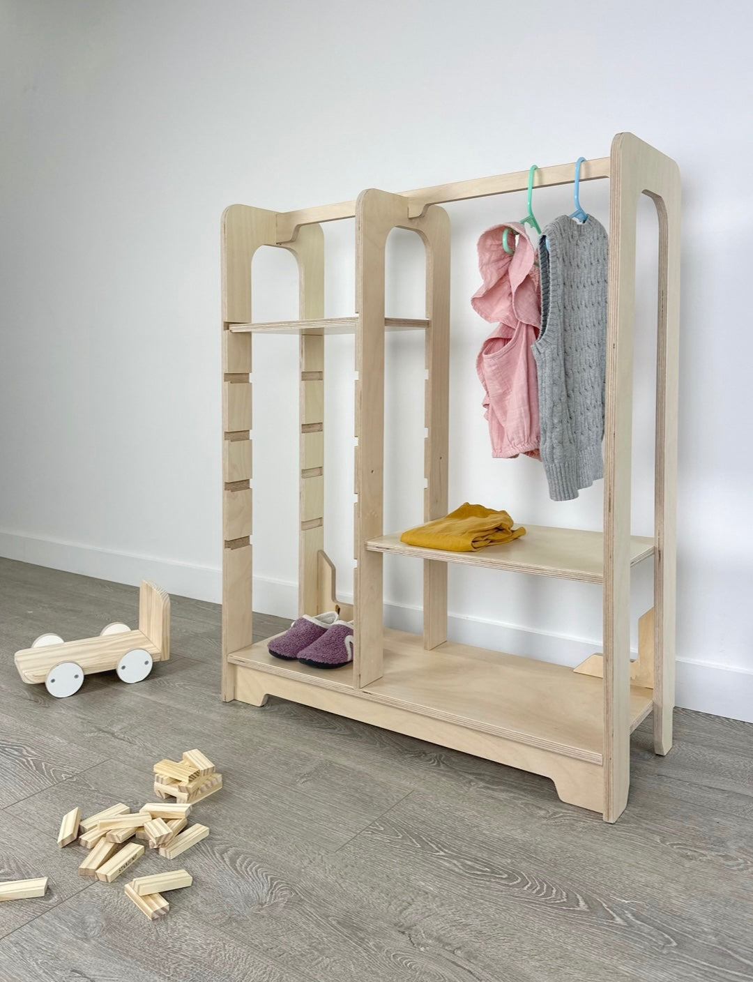 Empower little ones: Montessori-inspired wardrobe with adjustable shelves.