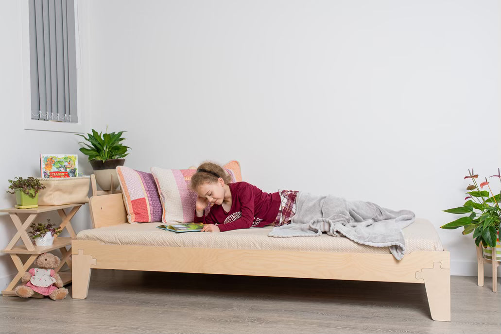 Montessori-designed kids bed frame: start low, flip for teens and adults