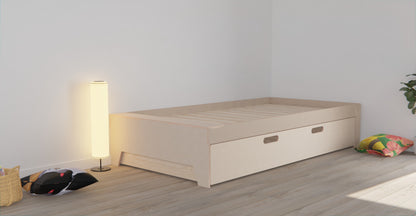 Low-profile storage bed frame with a spacious under-bed drawer on casters for easy access
