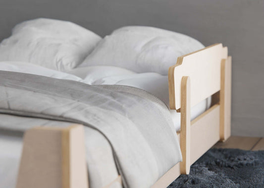 Discover the transformative flippable kids bed frame with guardrail, designed to follow the Montessori method