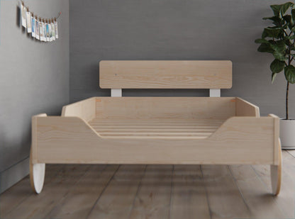 Enhance your toddler's bed with our guardrails and headboards