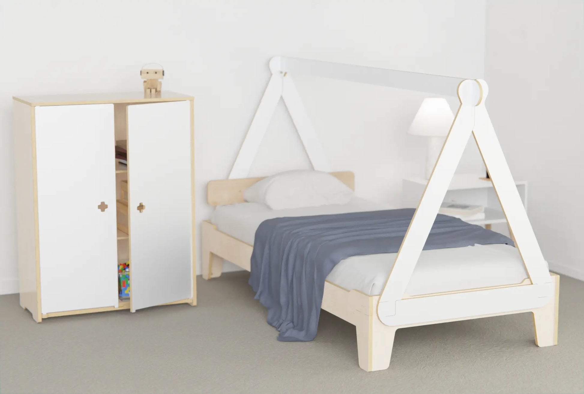 Kids’ canopy floor bed made from birch plywood, shown low to the floor for safe independent sleep