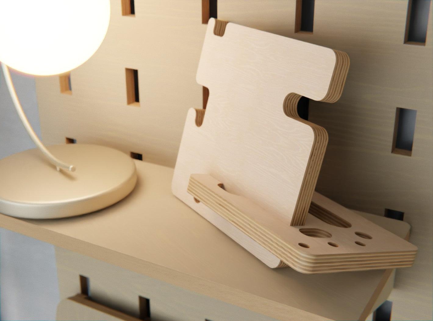 Keep your device at a comfortable viewing angle with our premium plywood phone stand. A stylish upgrade for your desk!