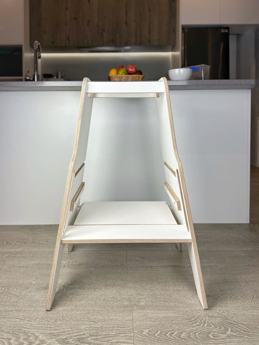 Portable learning tower with top handles — easy to move between rooms for study, play and kitchen time