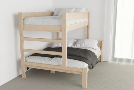 Simple NZ pine family bunk bed with roomy lower mattress and cosy top bunk against a white bedroom wall