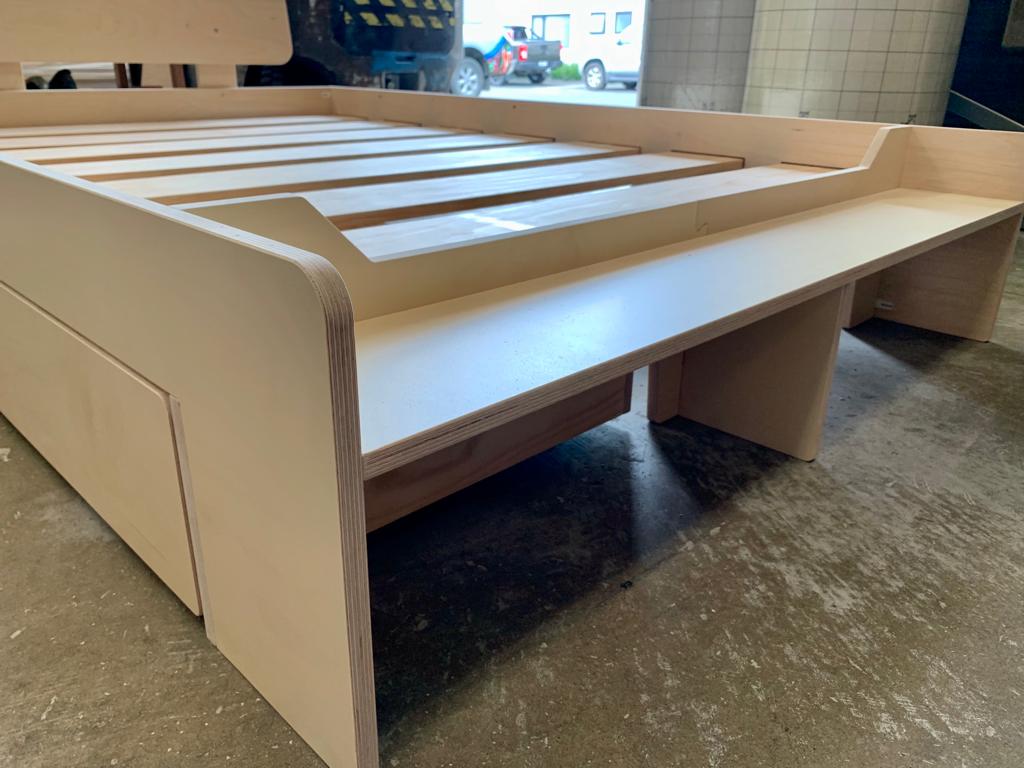 Double floor plywood bed with drawer and shelf for sale.