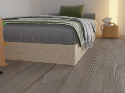 Montessori floor bed made in NZ from solid pine—safe for early sleepers
