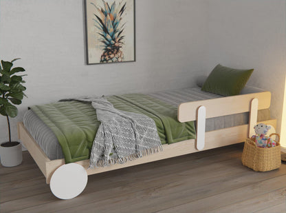 Montessori floor bed with optional guard rail for extra toddler safety